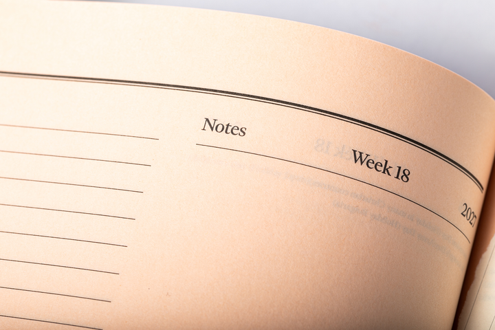 2027 Calendar Year Desk Diary – Day-a-Page Planner with Pink Paper – Luxury, Padded Faux Leather Cover in Black (DPC-27)